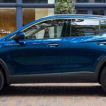 2023 Buick Encore exterior parked in front of shop