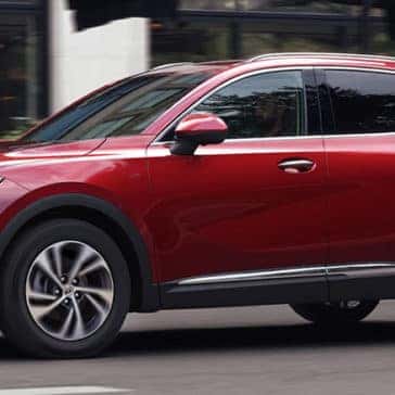 2023 Buick Envision exterior driving down city street