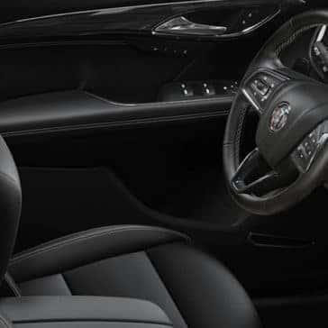 2023 Buick Envision interior of steering wheel and dashboard