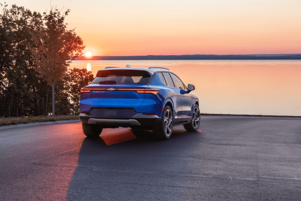 Chevrolet Equinox EV Parked Rear 3/4 View in Front of a Lake