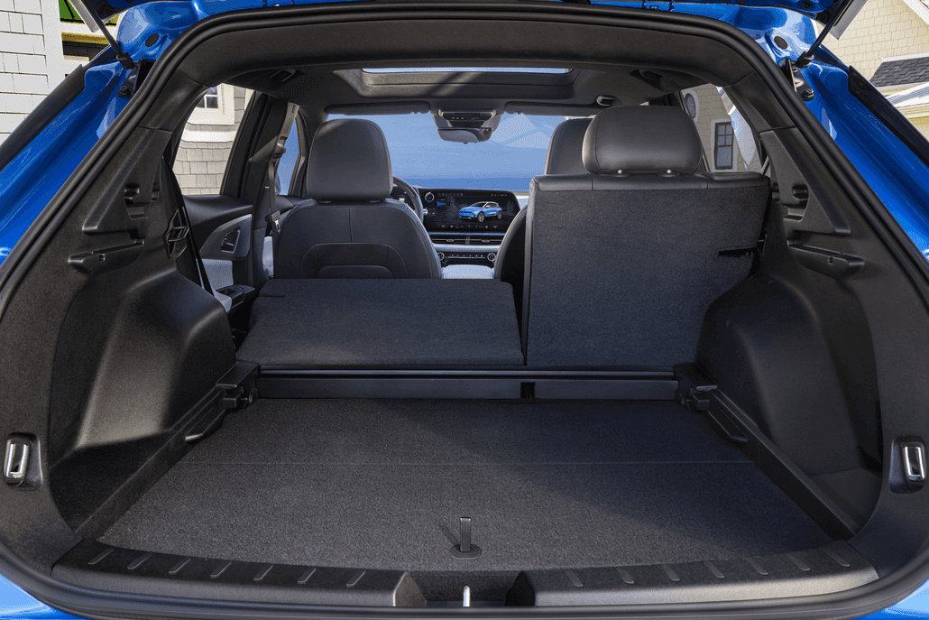 Riptide Blue Metallic 2024 Chevrolet Equinox EV LT cargo space with seat down