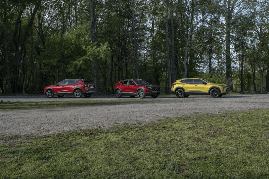 Three Chevrolet Traxes Parked in a Park