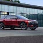 A Sexy Red 2024 Chevrolet Blazer EV Parked Outside A Dealership