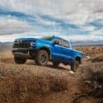 2024 Chevrolet Silverado ZR2 Front View Driving Off Road in a Remote Area