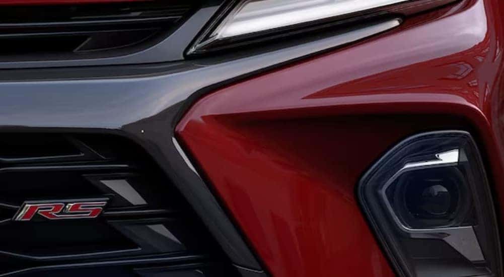 A close-up on the RS badge on a red 2024 Chevy Blazer RS.
