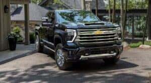 A black 2024 Chevy Silverado 3500HD is shown parked after viewing a Chevy Silverado for sale near Bossier City.