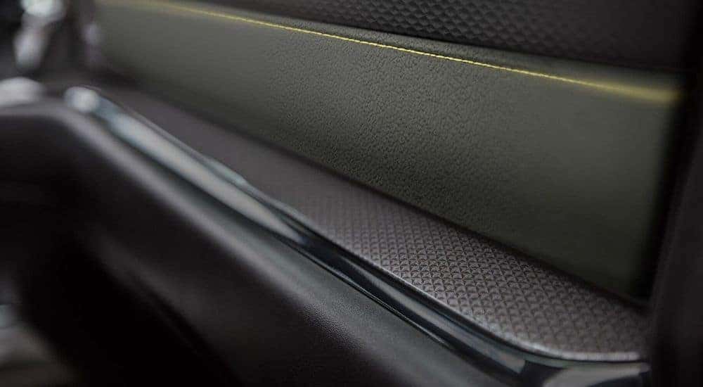 A close up shows interior trim details in a 2024 Chevy Silverado for sale near Waskom.