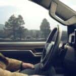 A person is shown using SuperCruise in a 2024 Chevy Silverado 1500.