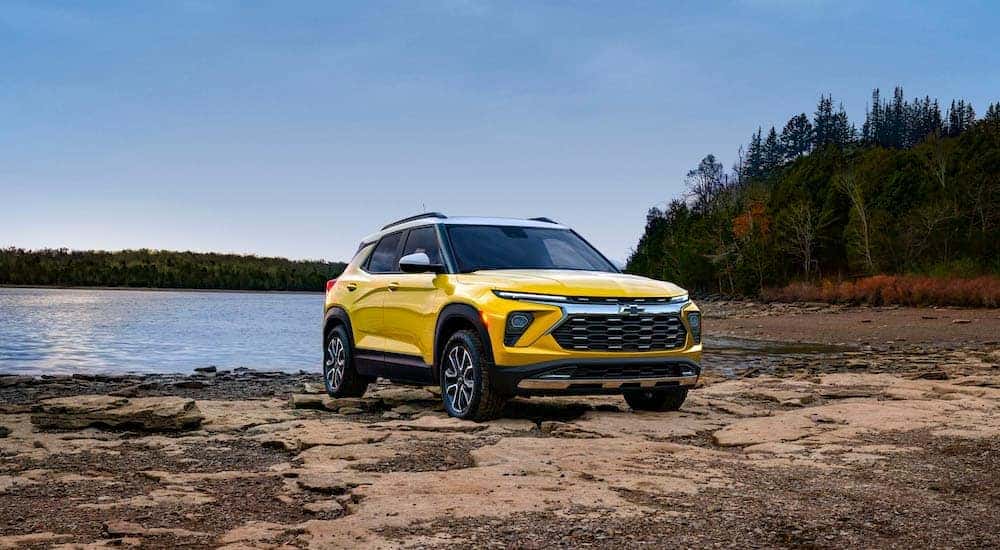 A yellow 2025 Chevy Trailblazer ACTIV is shown from the front at an angle after leaving a Chevy dealer near Carthage.