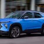 A blue 2024 Chevy Trailblazer RS is shown from the front at an angle.