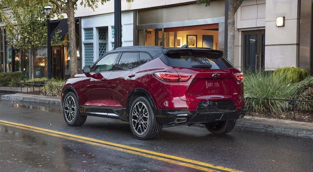 A red 2025 Chevy Blazer RS is shown from the rear at an angle.