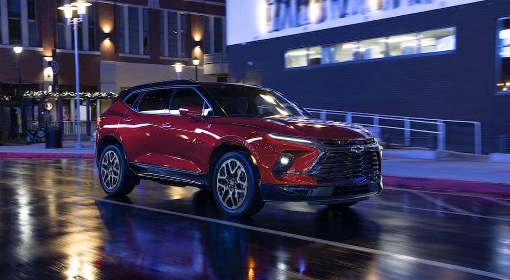 A red 2025 Chevy Blazer RS is shown from the front at an angle after leaving a Chevy dealer near Marshall.