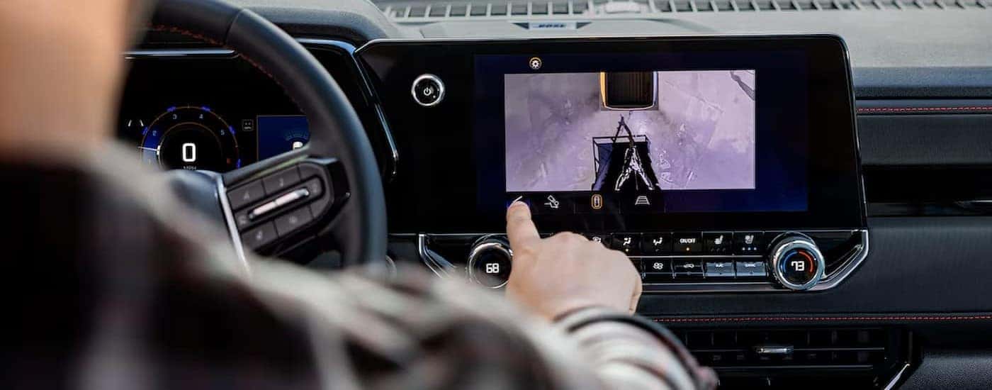 A close-up of the infotainment screen is shown in a 2024 Chevy Colorado.