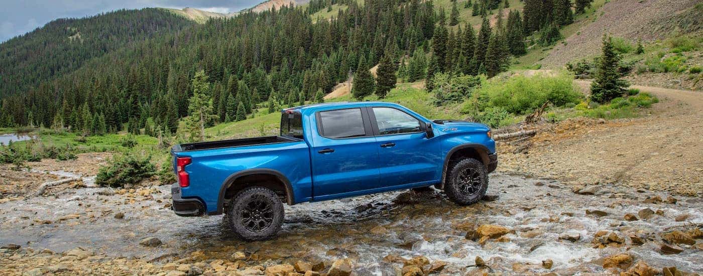A blue 2022 Chevy Silverado 1500 ZR2 while off-road.