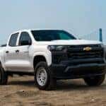 A white 2025 Chevy Colorado WT on a worksite after leaving a Chevy dealer near Ruston.