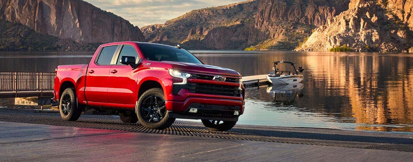 A red 2022 Chevy Silverado 1500 RST is shown parked after viewing a Chevy Silverado for sale near Waskom.