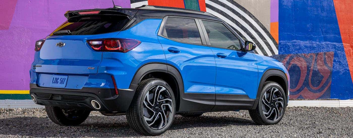 A blue 2025 Chevy Trailblazer RS from the rear at an angle.