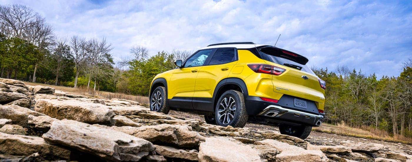 A yellow 2025 Chevy Trailblazer from the rear at an angle.