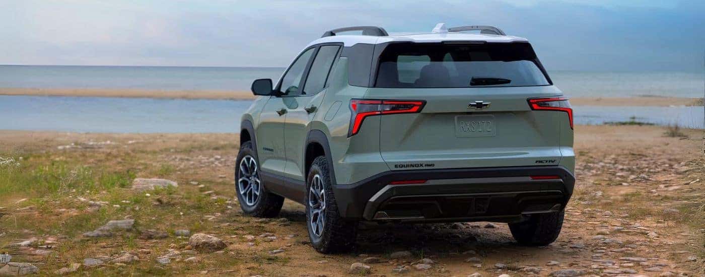 Rear of a 2025 Chevy Equinox ACTIV parked off-road.