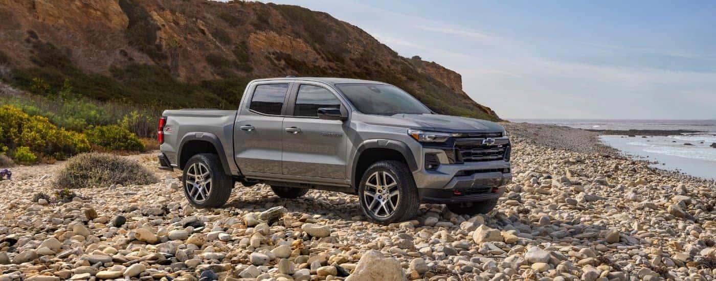 A silver 2025 Chevy Colorado for sale from the side.