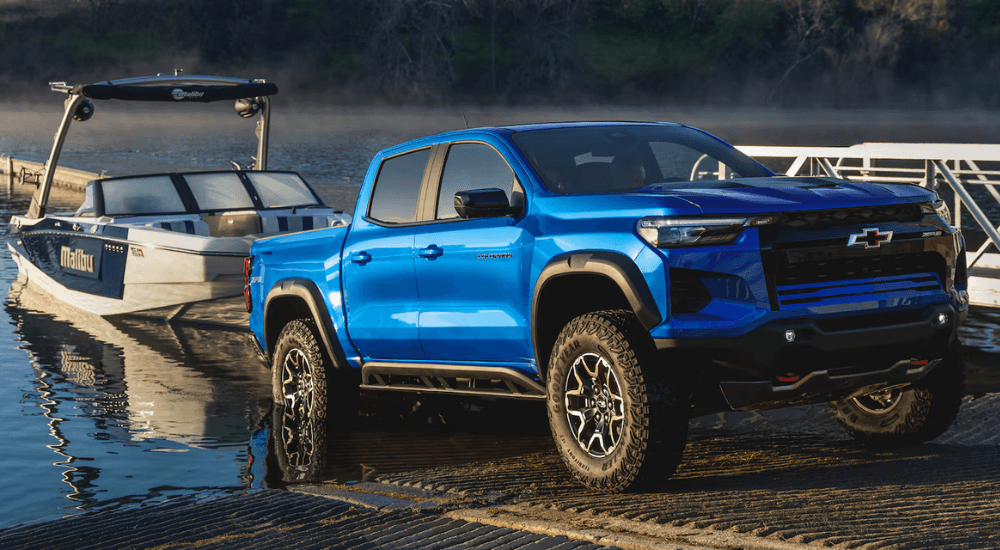 Blue 2026 Chevy Colorado pulling a boat out of water