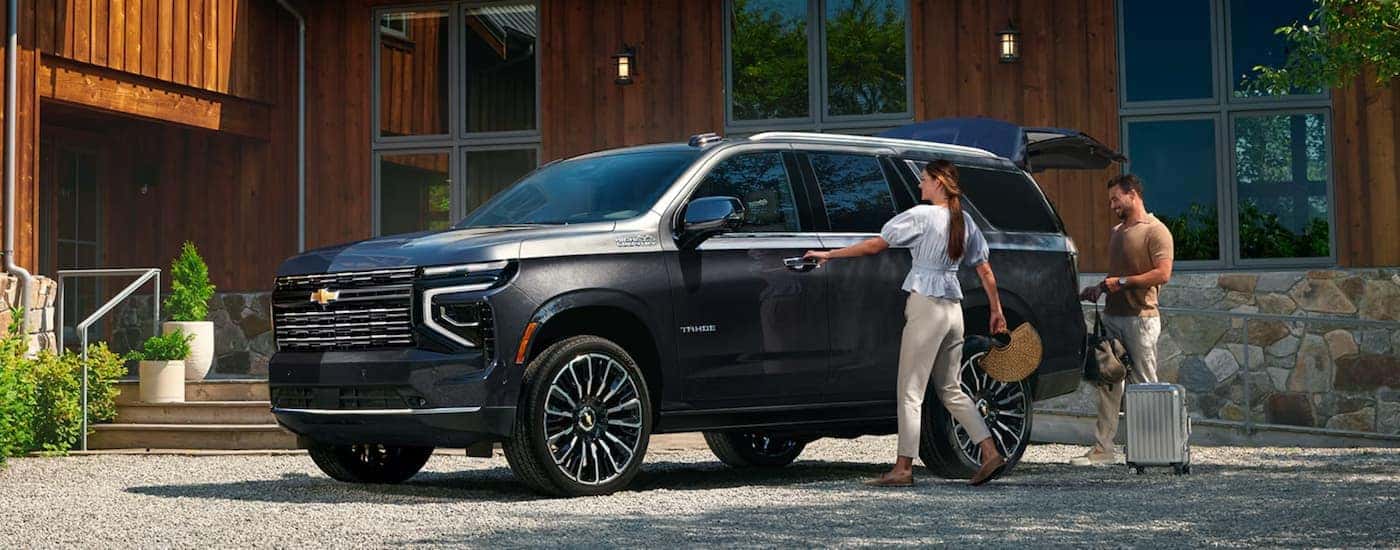 Black 2026 Chevy Tahoe High Country for sale near Bossier City parked outside a building.