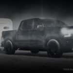 Black 2026 Chevy Silverado 1500 with a horse trailer