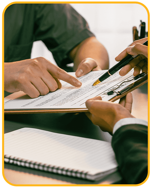 Things to Check When Buying a Used Car | CMA Chevrolet of Martinsburg in Martinsburg, WV | Person holding a clipboard with car history report while showing it to the customer
