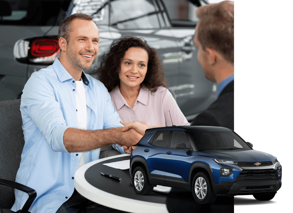 Best Time To Buy At CMA Chevrolet of Martinsburg in Martinsburg, WV | Blue 2022 Chevrolet TrailBlazer with a background photo of a couple smiling and shaking hands with the sales person on car deal 