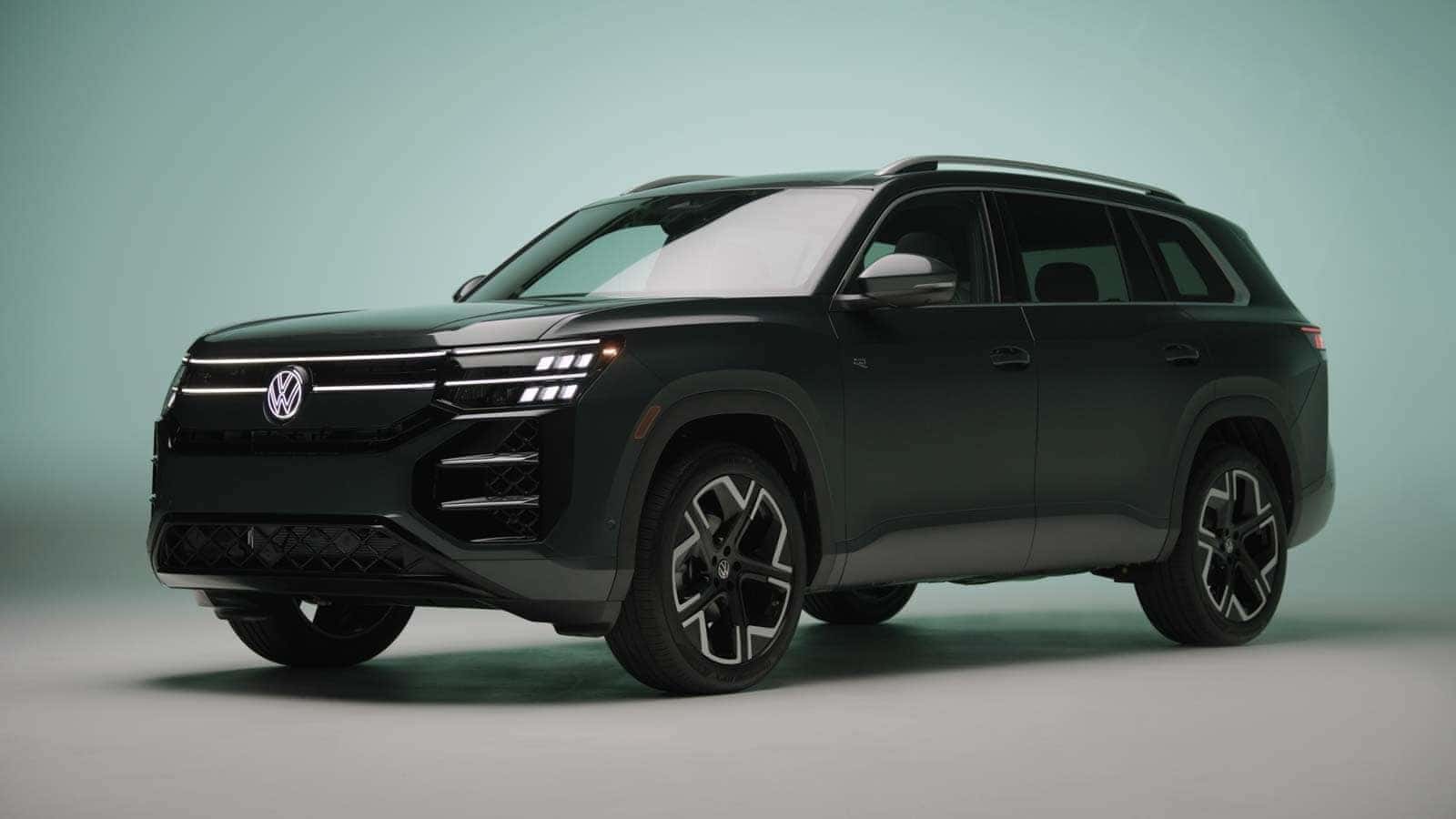 Front three-quarter view of the 2027 Volkswagen Atlas in Sacramento Green at Emich Volkswagen of Boulder
