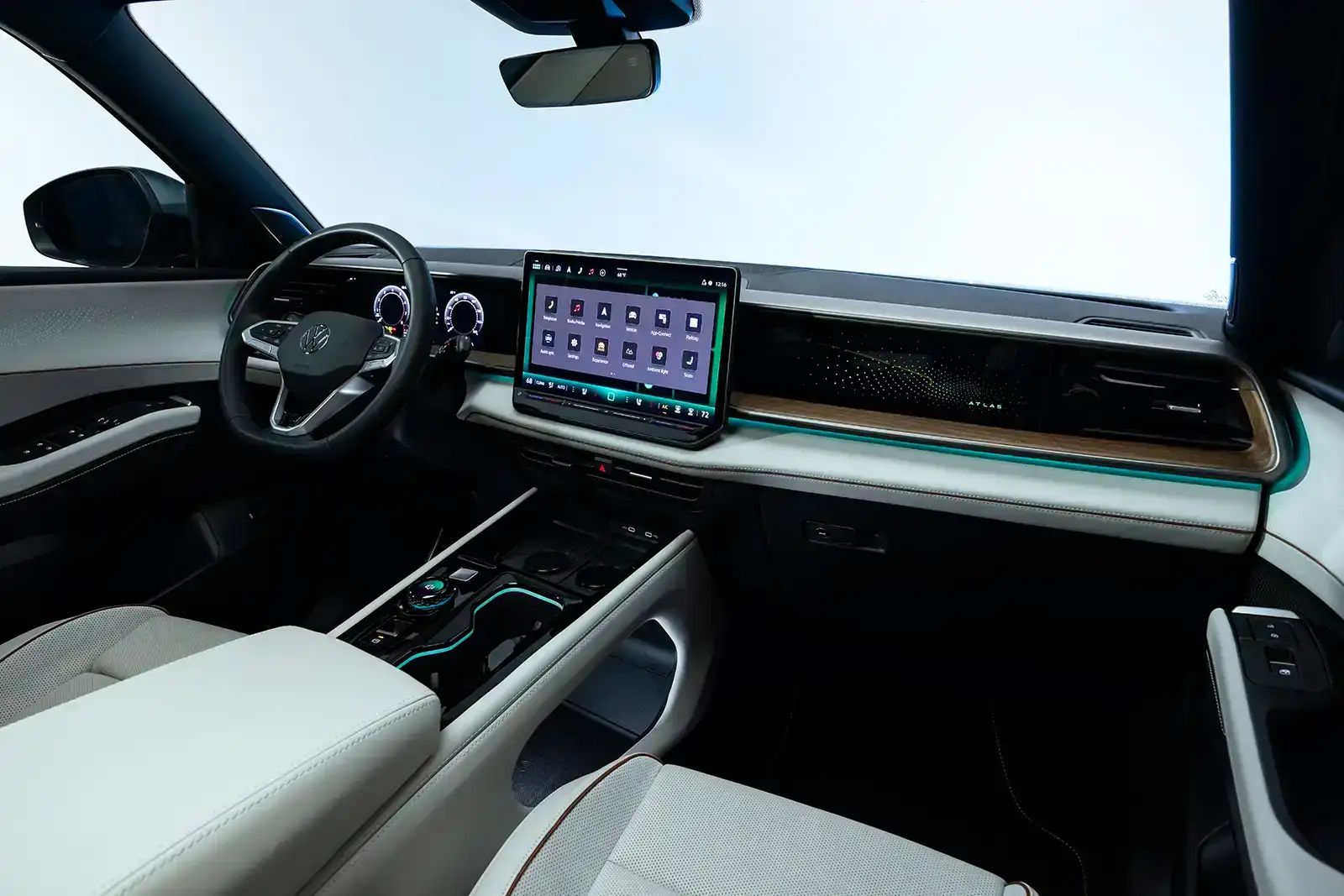 Interior of the 2027 Volkswagen Atlas showing the 15-inch touchscreen, digital cockpit, and premium cabin materials