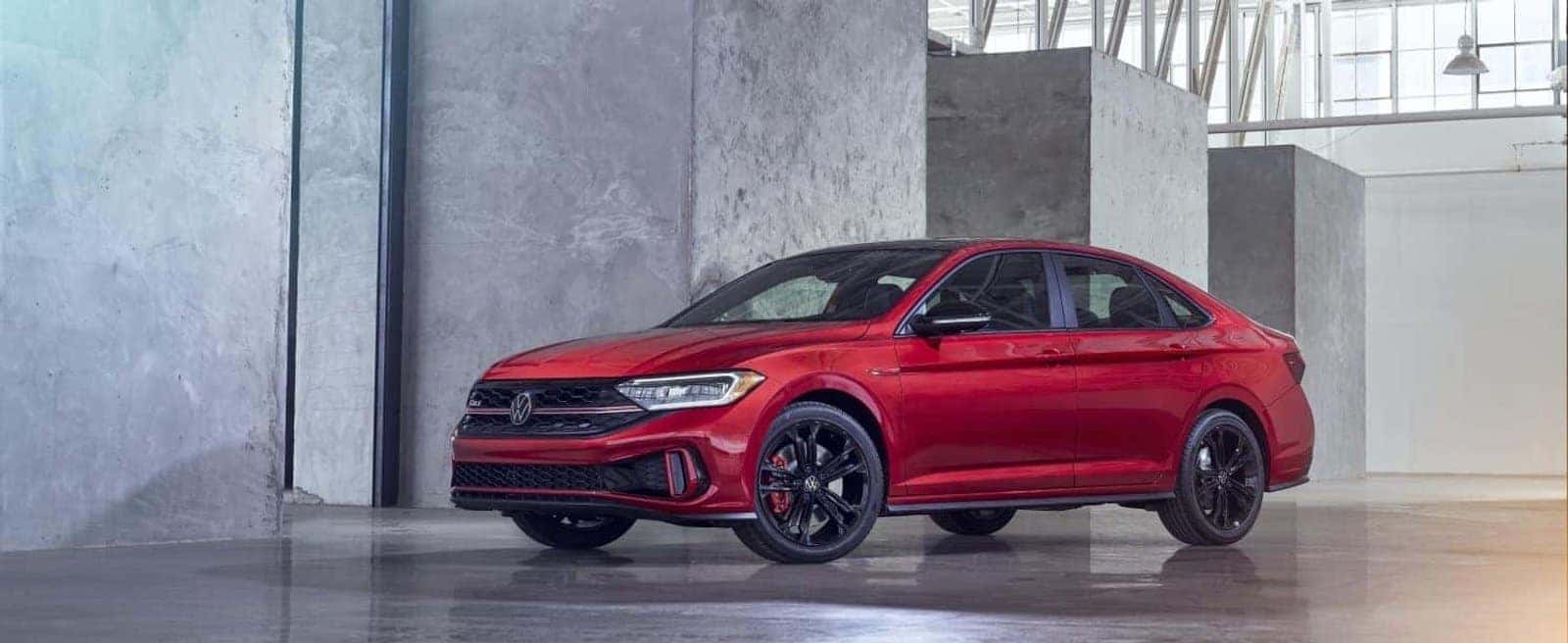 2026 Volkswagen Jetta GLI in red, front three-quarter view