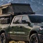 2026 Ram 1500 with bed rack and roof tent in a Pacific Northwest mountain setting