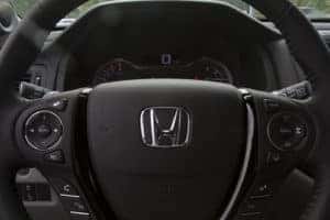 Up close photo of the steering wheel of the 2022 Honda CR-V