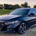 Up close image of the front of a black 2023 Honda Accord