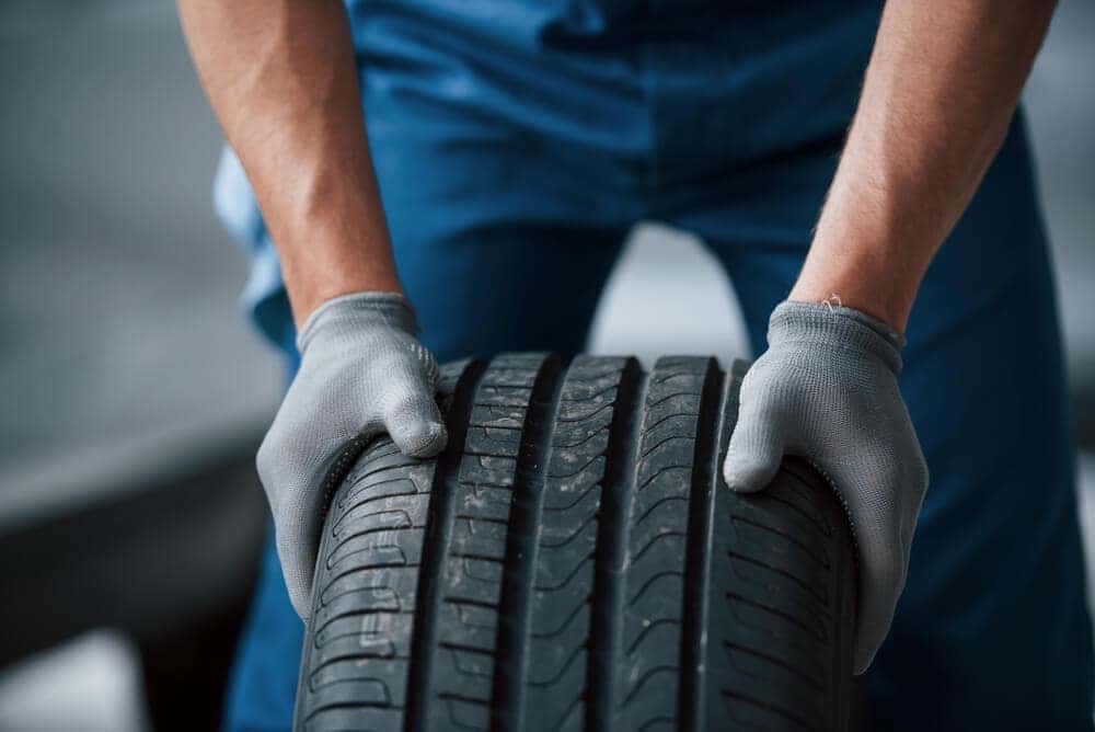 Tire change at Service Center For Used Cars Near Weymouth, MA | Ira Acura Westwood