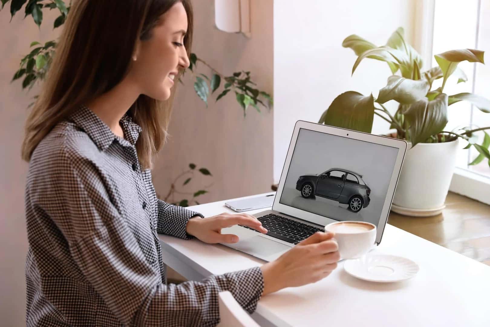 Woman online car shopping