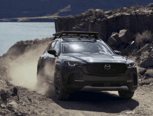 Mazda CX-50 driving on dirt road