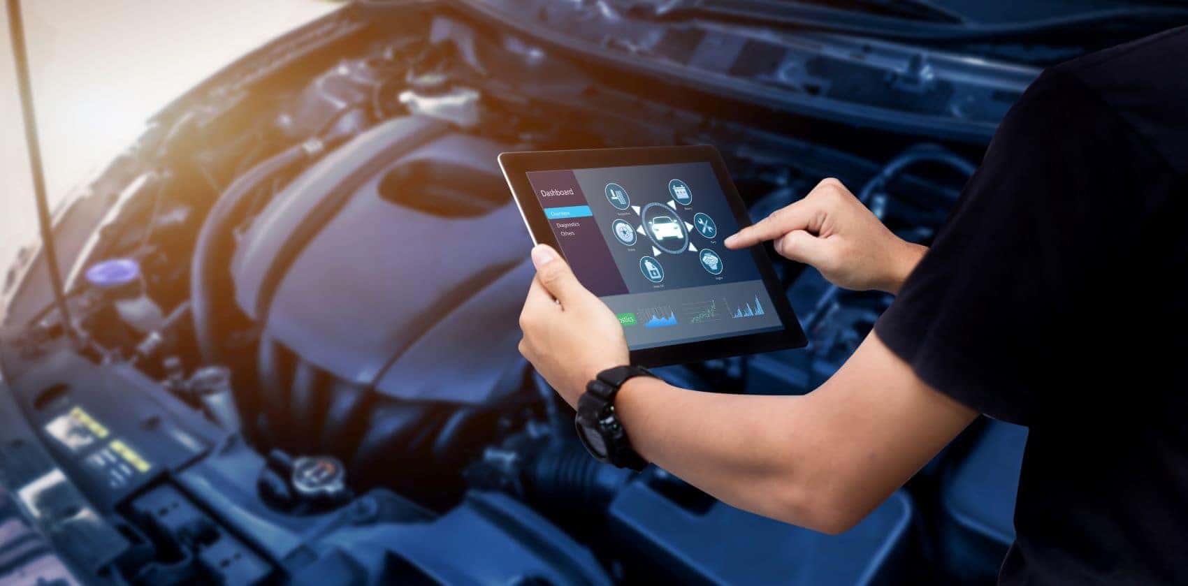 Technician Inspecting Car