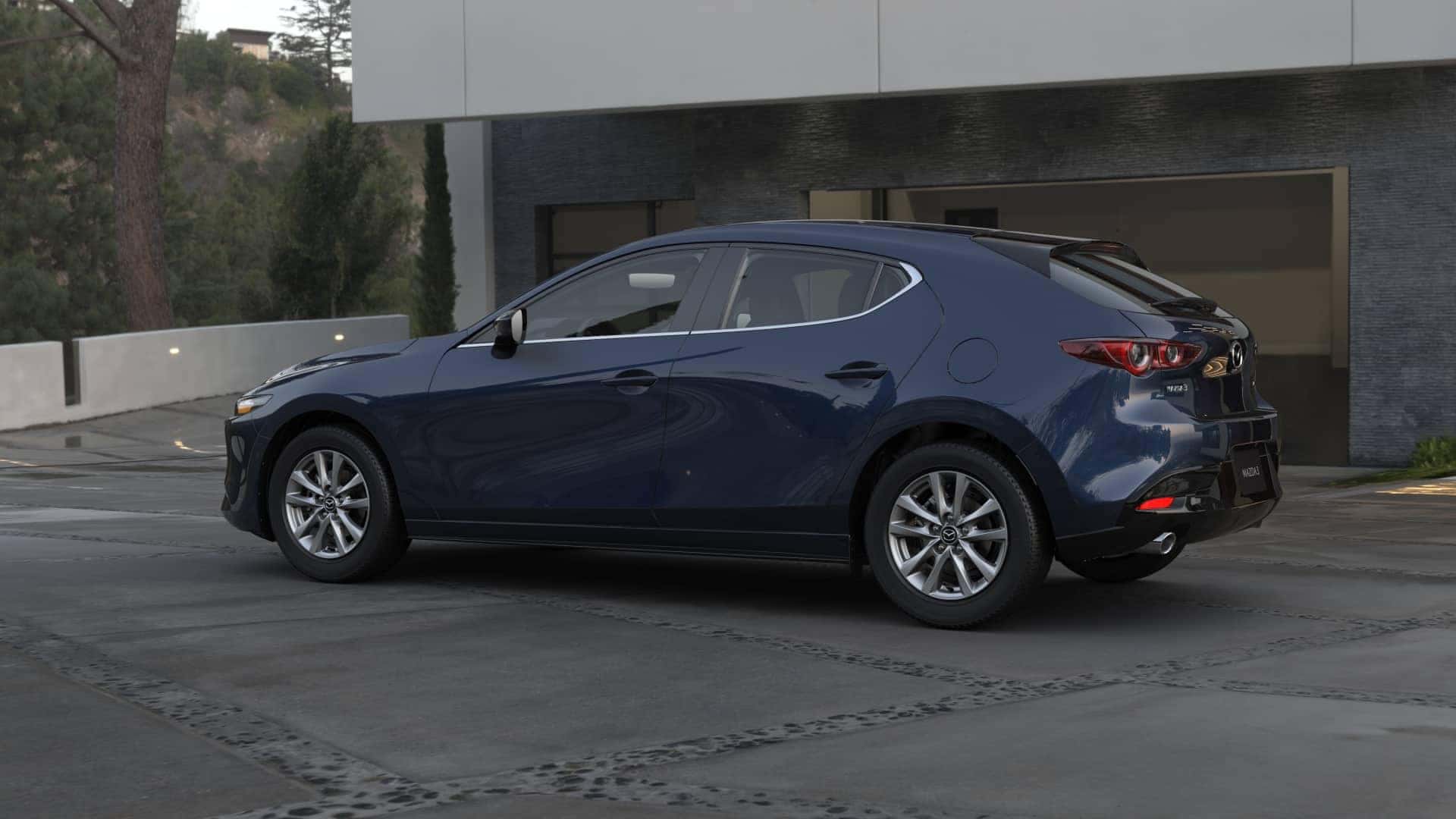 Blue Mazda 3 Hatchback Outside House