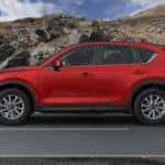 White Mazda CX-5 SUV Outside Buildings