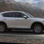 White Mazda CX-5 SUV Outside Mountains