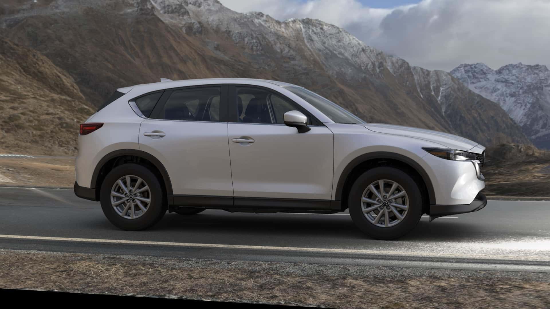 White Mazda CX-5 SUV Outside Mountains