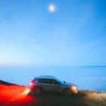 Gray Mazda CX50 SUV Outside Moon Water