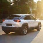 2022-mazda-mx-30-electric-car-back-view-driving
