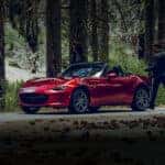 Red Mazda Miata MX-5 Sports Car Two People Woods