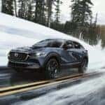 Blue Mazda CX-30 SUV Winter Street Road Trees