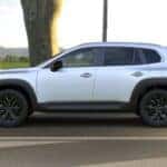 Green Mazda CX-50 SUV Snow Trees People