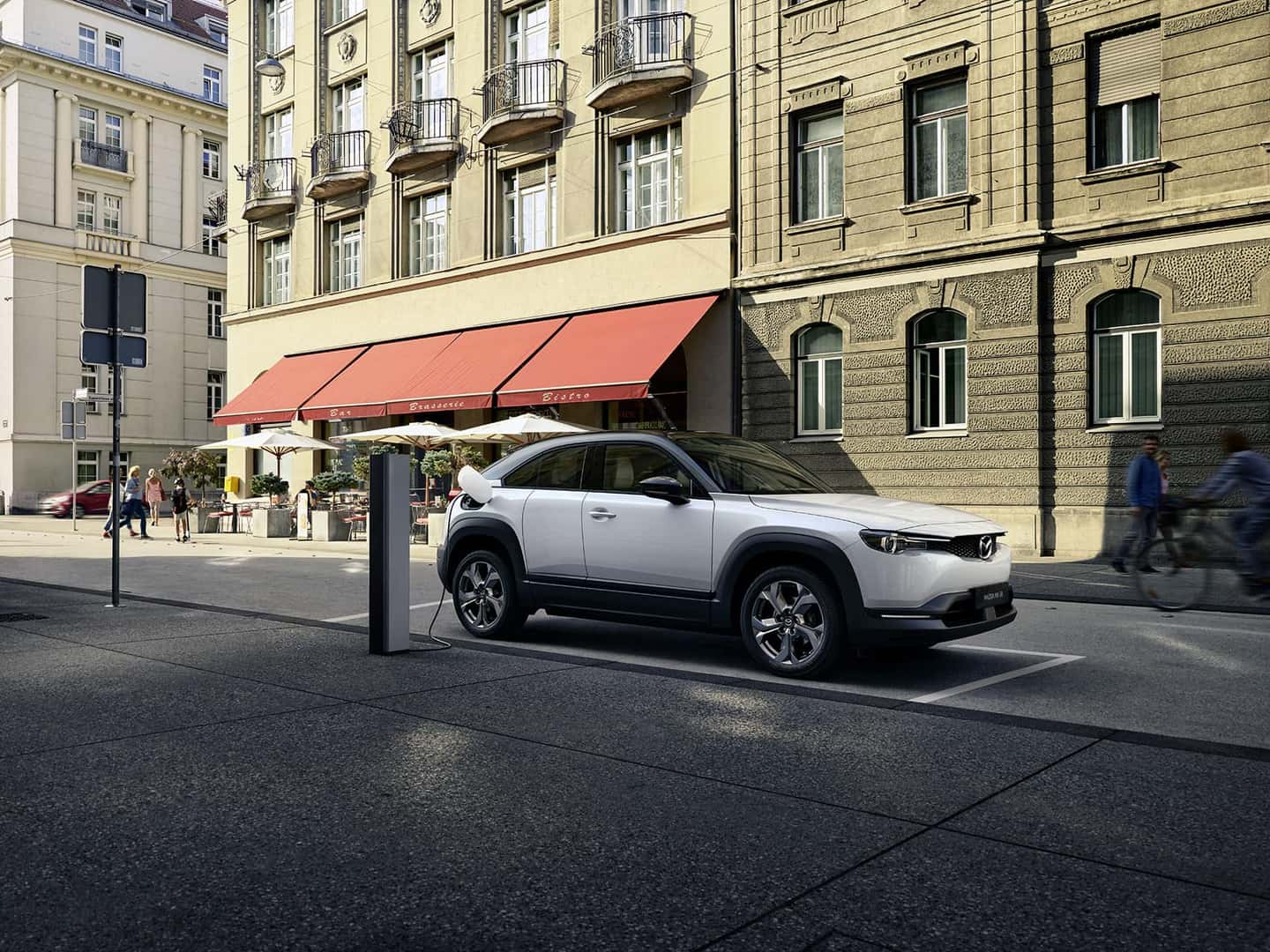 White Mazda MX-30 SUV EV Buildings