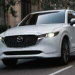 White Mazda CX-5 SUV Buildings